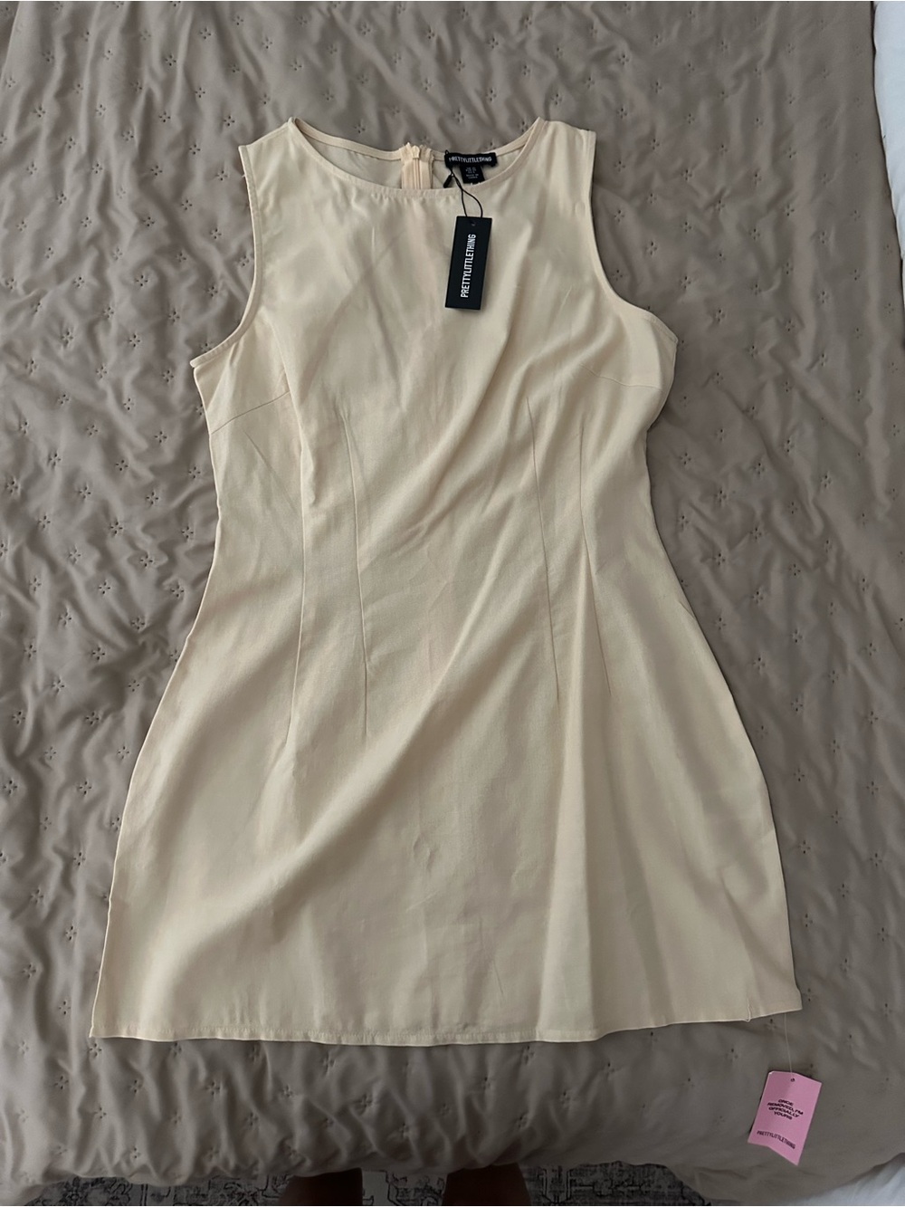 PrettyLittleThing Cream Sleeveless Mini Dress